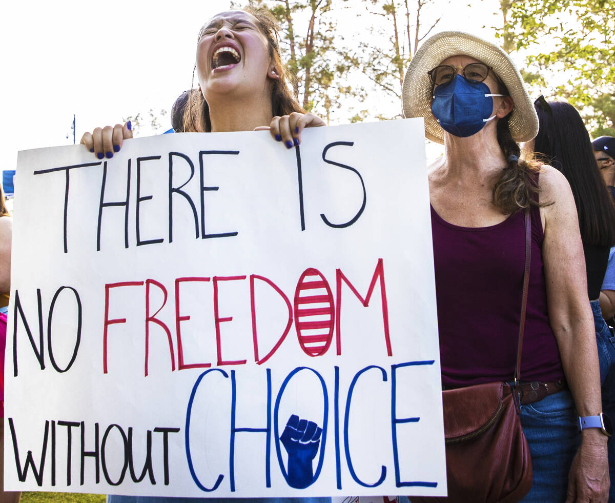 Miranda Lee, left, and mother Diana Padgett protest during a pro-abortion rally organized by Pl ...
