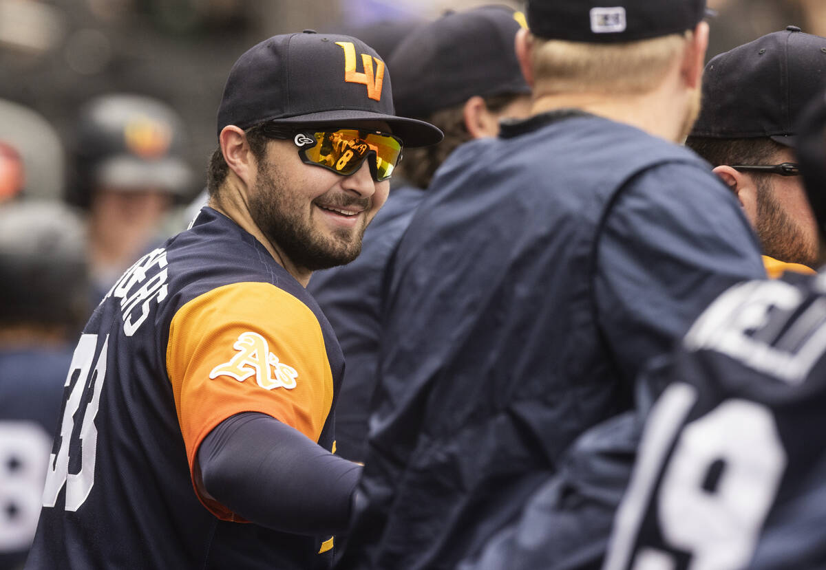 Aviators catcher Shea Langeliers (33) jokes around with teammates during a minor league basebal ...