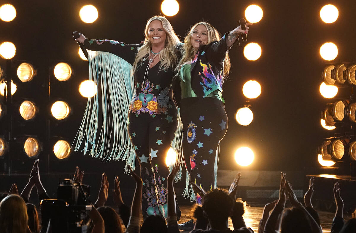 Miranda Lambert, left, and Elle King are seen on stage after performing "Drunk (And I Don' ...