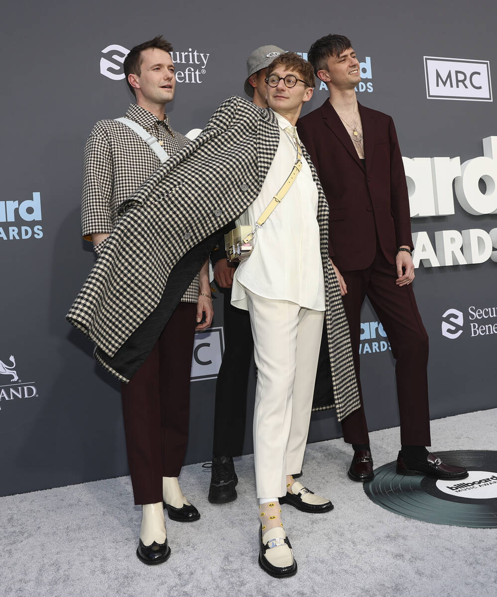 Members of Glass Animals pose on the red carpet for the Billboard Music Awards at the MGM Grand ...