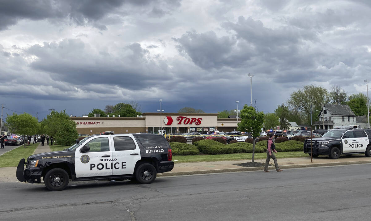 Buffalo Police respond to a shooting at Tops Friendly Market in Buffalo, N.Y., Saturday, May 14 ...