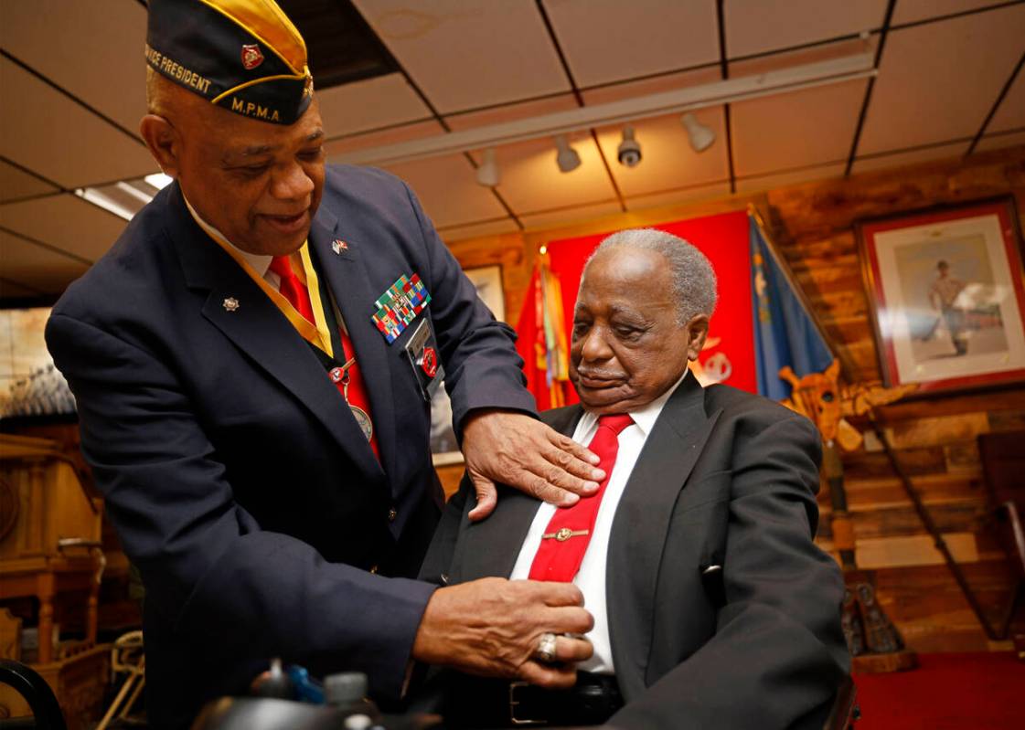Michael Johnson, Western Region vice president, Montford Point Marine Association Inc., left, g ...