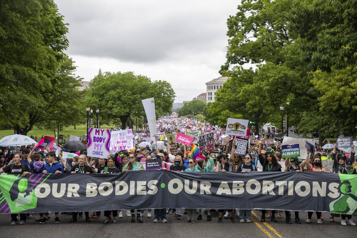 An abortion rights march extends down the streets during a demonstration from the National Mall ...