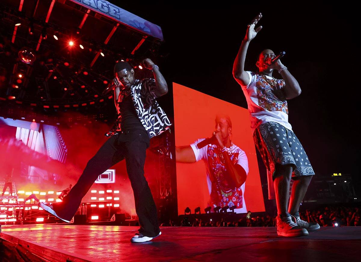 Usher, left, and Ludacris perform during the Lovers & Friends music festival on Saturday, M ...