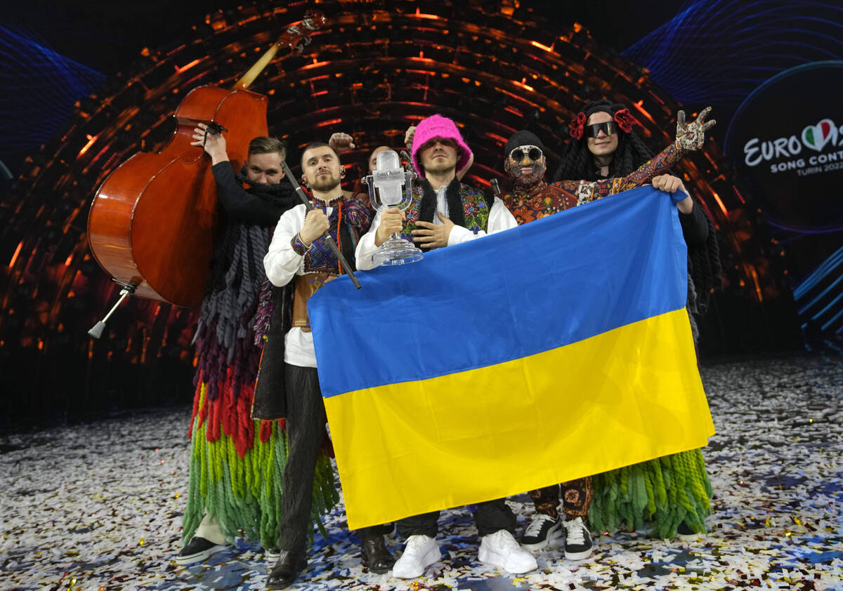 Members of the Kalush Orchestra from Ukraine celebrate after winning the Grand Final of the Eur ...