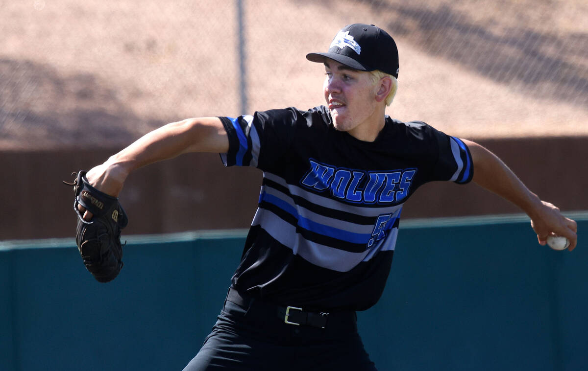 Basic pitcher Ben Smith delivers during the first inning of a baseball game against Bishop Gorm ...