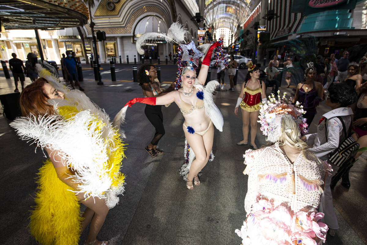 Participants, including event organizer and entertainer Lolita Haze, dance during the Las Vegas ...