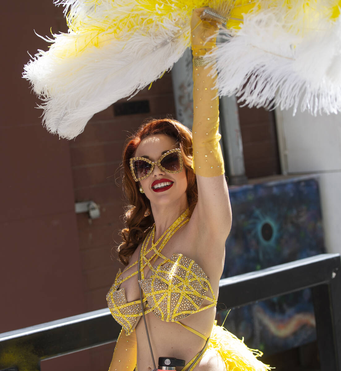 Entertainer Ginger Watson performs in the Las Vegas Showgirl parade walk along the Fremont Stre ...