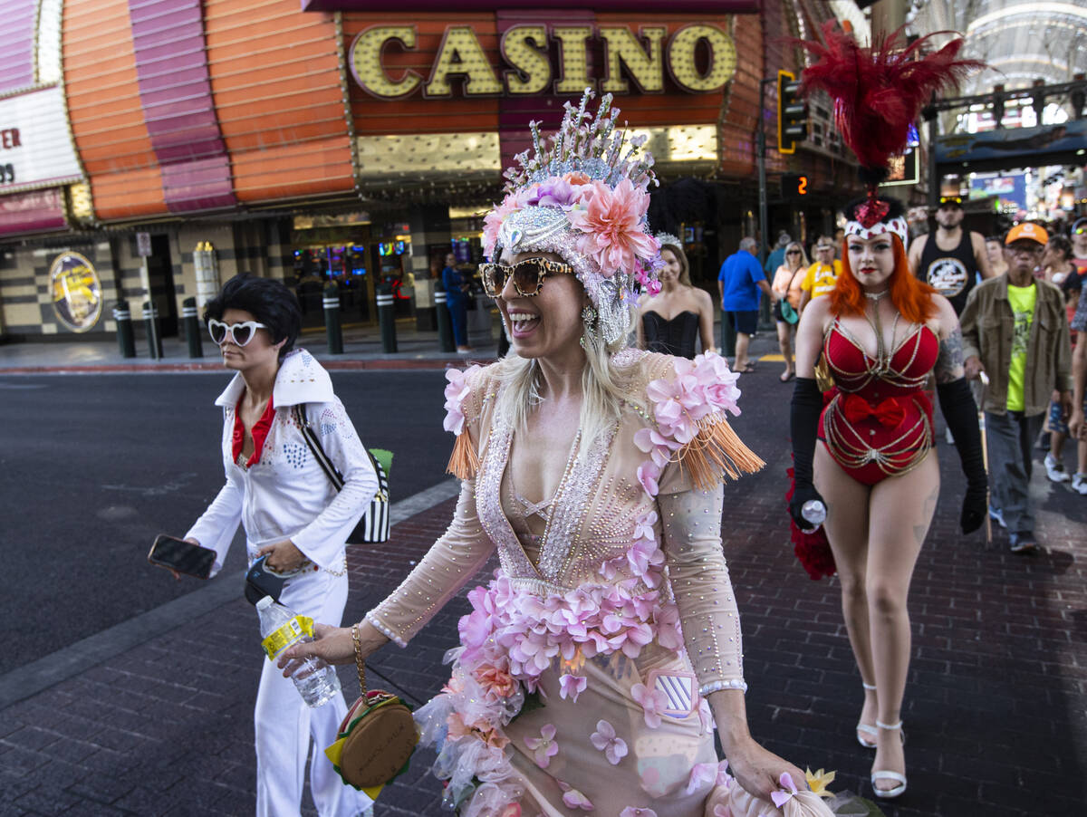 Ily Royale w/ Cheese participate in the Las Vegas Showgirl parade walk along the Fremont Street ...