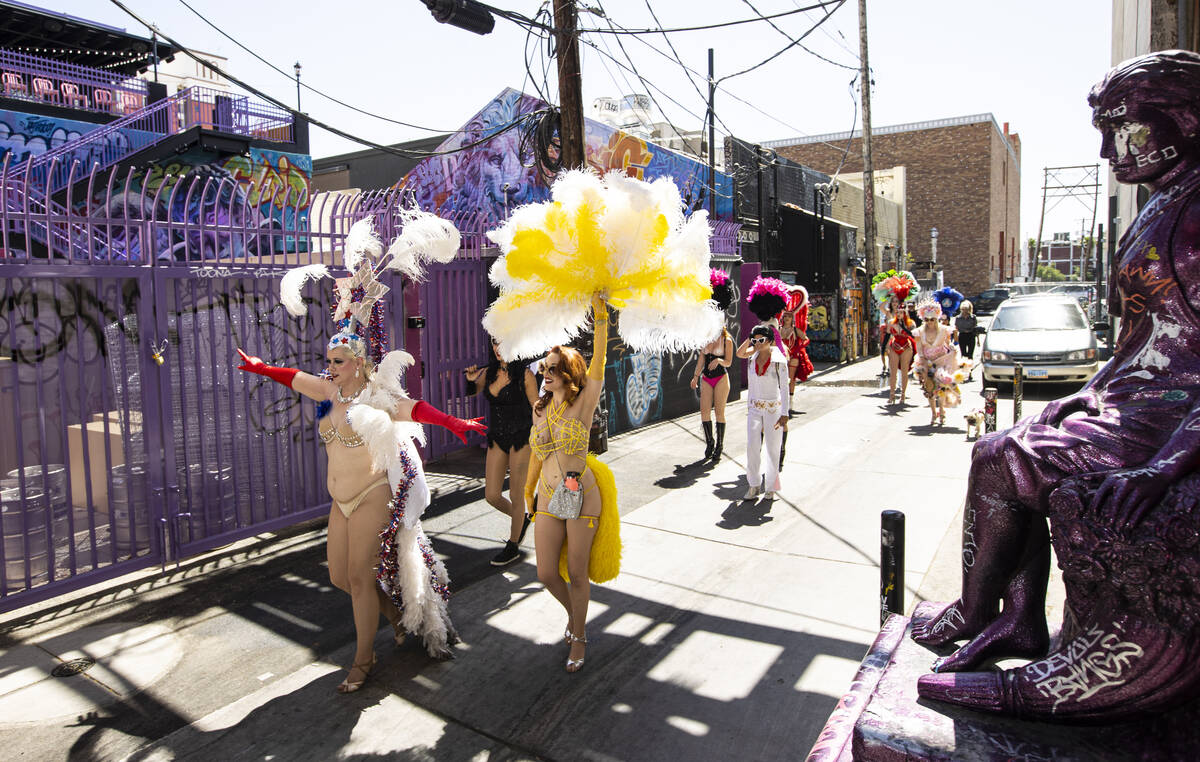 Entertainer Lolita Haze, left, leads the Las Vegas Showgirl parade as Ginger Watson, second fro ...
