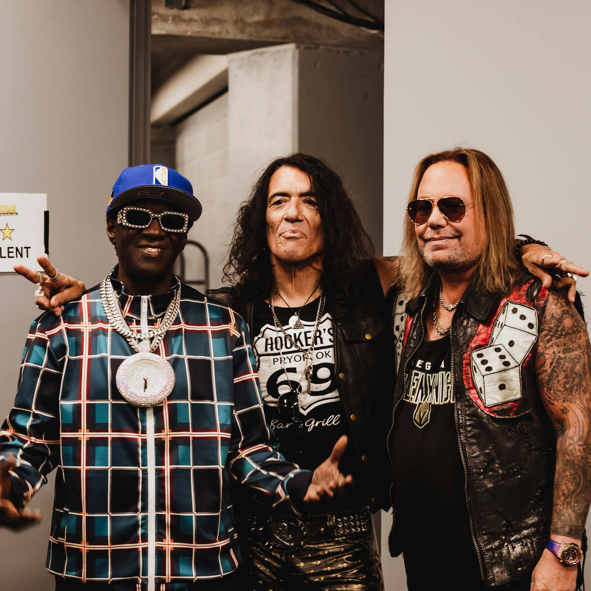 Flavor Flav, Steven Pearcy and Vince Neil are shown at The Dollar Loan Center's new ad campaign ...