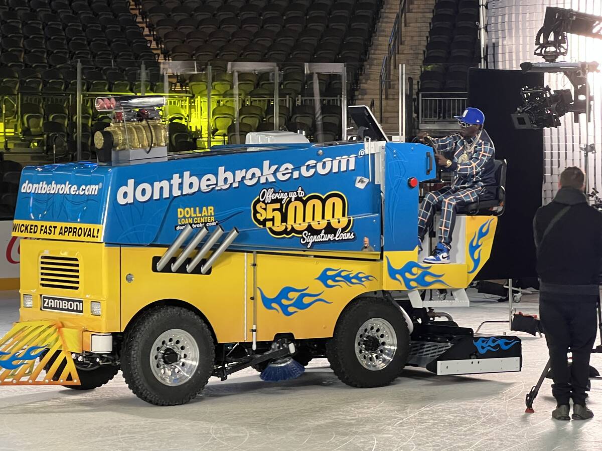Flavor Flavor is shown driving the Zamboni during The Dollar Loan Center's new ad campaign on T ...