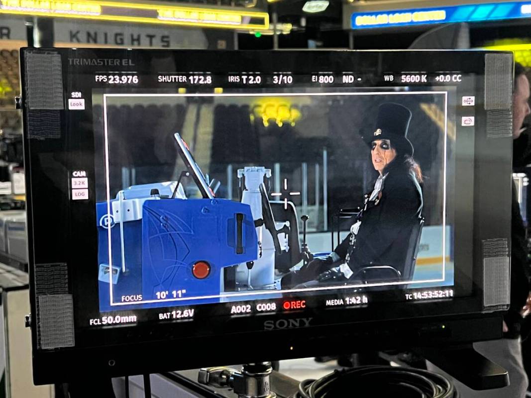 Alice Cooper is shown on video during a Zamboni ride for The Dollar Loan Center's new ad campai ...