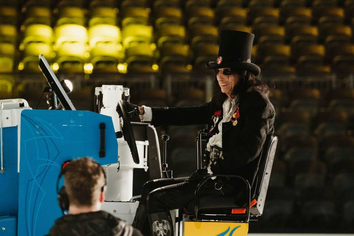 Alice Cooper is shown on video during a Zamboni ride for The Dollar Loan Center's new ad campai ...