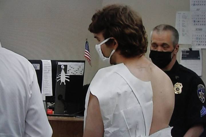 In a photo shot from television, Payton Gendron is arraigned before a judge, Saturday, May 14, ...