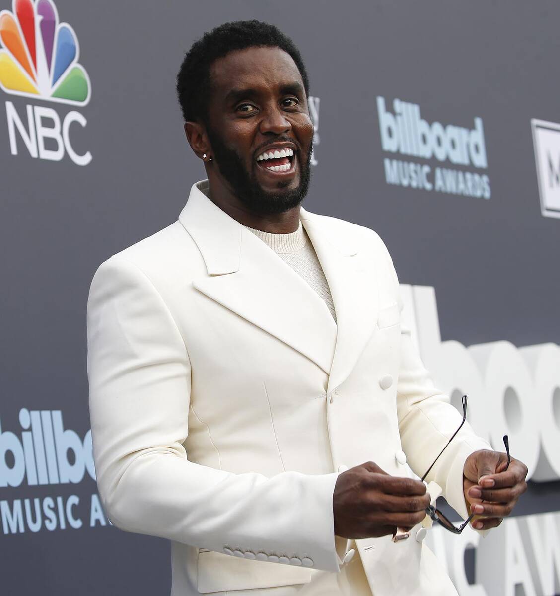 Sean ‘Diddy’ Combs reacts on the red carpet for the Billboard Music Awards at the MGM Grand ...
