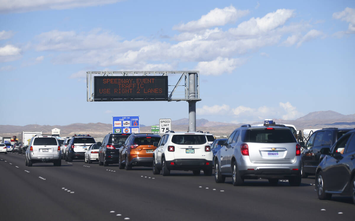 Traffic backs up on Interstate 15 as Electric Daisy Carnival attendees approach Speedway Boulev ...