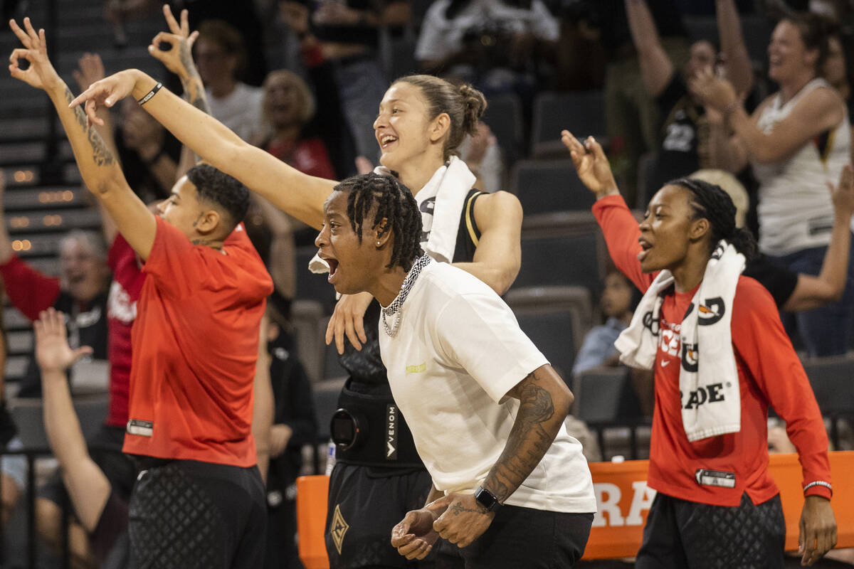 Aces guard Riquna Williams (2) erupts with the bench after a big play in the second half of a W ...