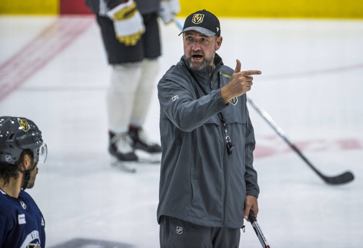 Vegas Golden Knights head coach Peter DeBoer instructs his players while running a new drill du ...