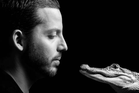 David Blaine is shown with the alligator he uses in his street-magic act. (courtesy)