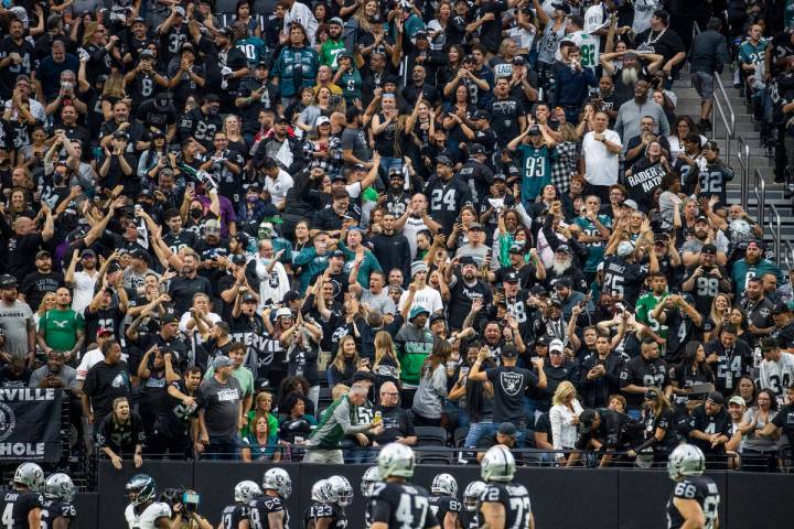 Raiders fans celebrate another score over the Philadelphia Eagles during the first half of an N ...