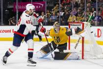 Golden Knights goaltender Logan Thompson (36) makes a save against Washington Capitals right wi ...
