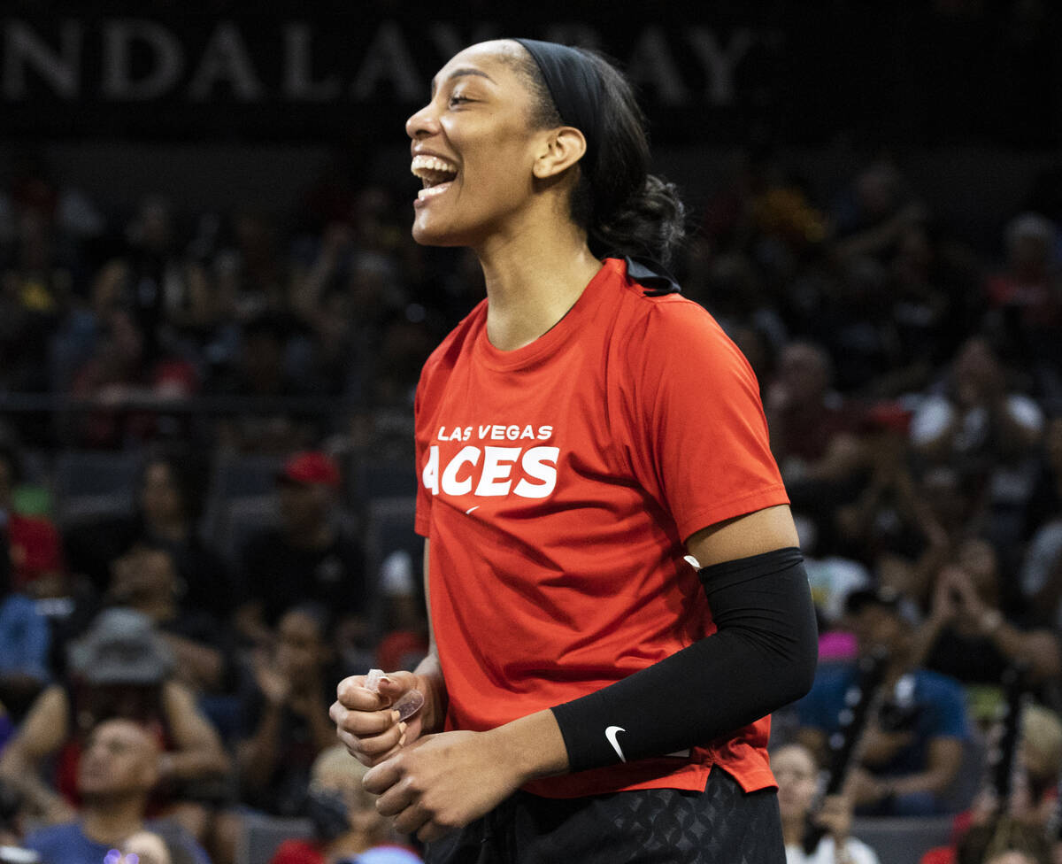 Aces forward A'ja Wilson (22) celebrates a big offensive play in the second half during a WNBA ...