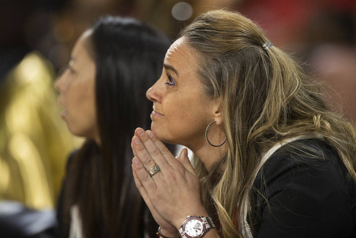 Aces head coach Becky Hammon watches her team from the bench in the second half during a WNBA b ...