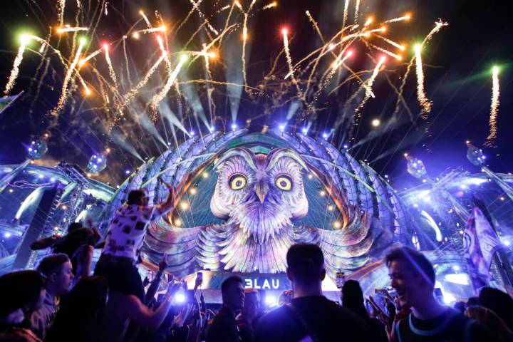 Fireworks light up the stage as DJ 3Lau performs at the Kinetic Field stage during the final da ...
