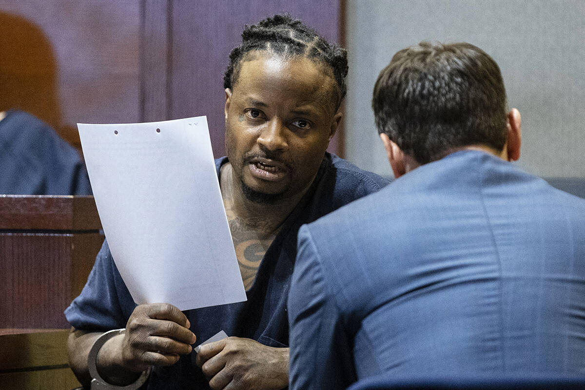 Lee Wilson, a suspect in the Feb. 26 shootout at a hookah lounge in Las Vegas, talks to his att ...