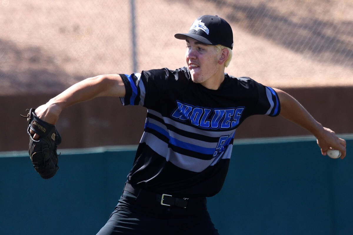 Basic pitcher Ben Smith delivers during the first inning of a baseball game against Bishop Gorm ...