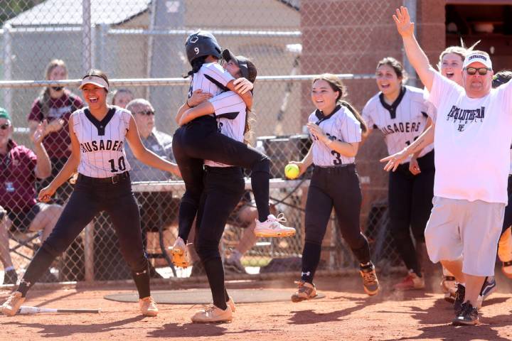 Faith Lutheran players celebrate beating Green Valley in their Class 5A Southern Region softbal ...