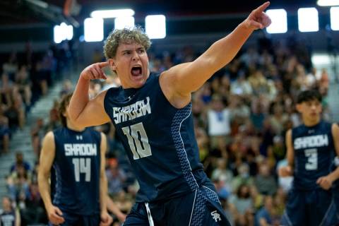 Shadow Ridge outside hitter Trevor Prince (10) cheers after making a kill against Green Valley ...