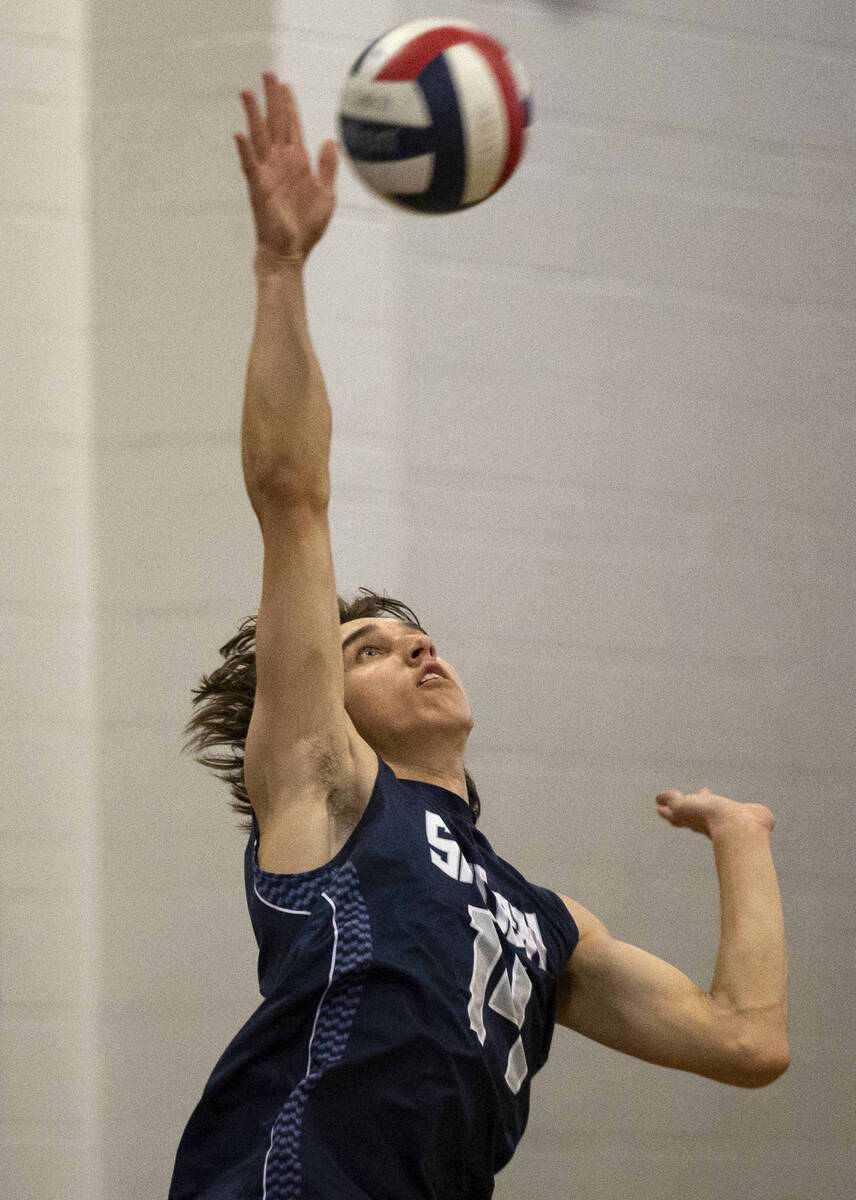 Shadow Ridge outside hitter Brady Beko (14) serves to Green Valley during the Class 5A boys vol ...
