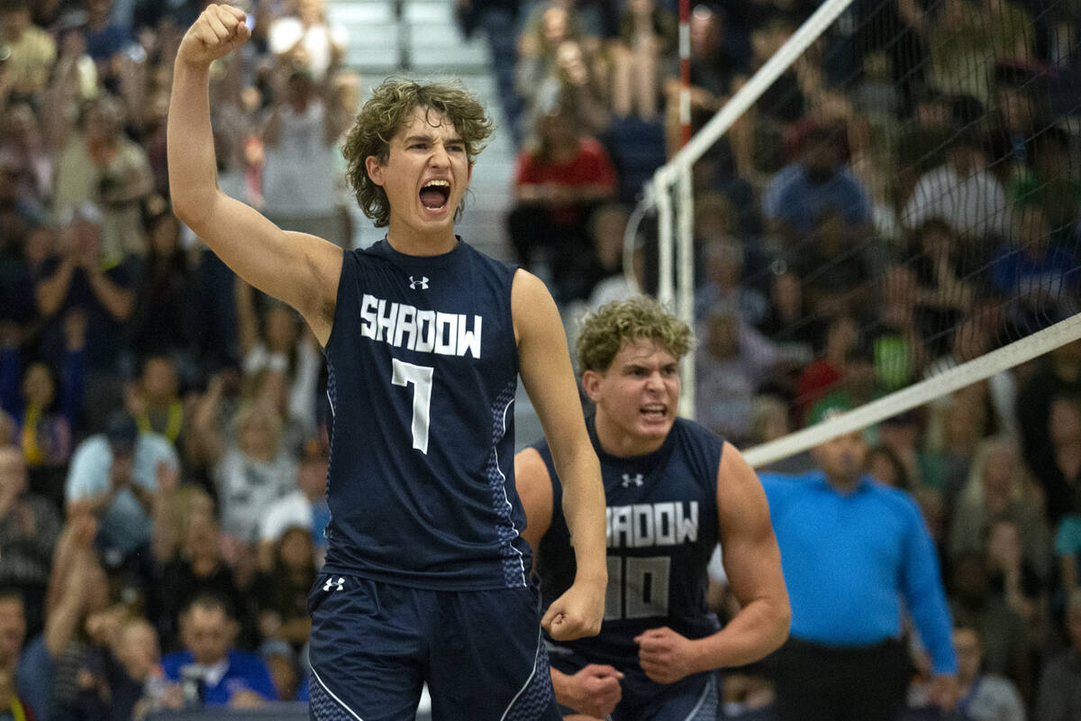 Shadow Ridge’s Tyler Kirk (7) and Trevor Prince (10) cheer after winning a set during th ...