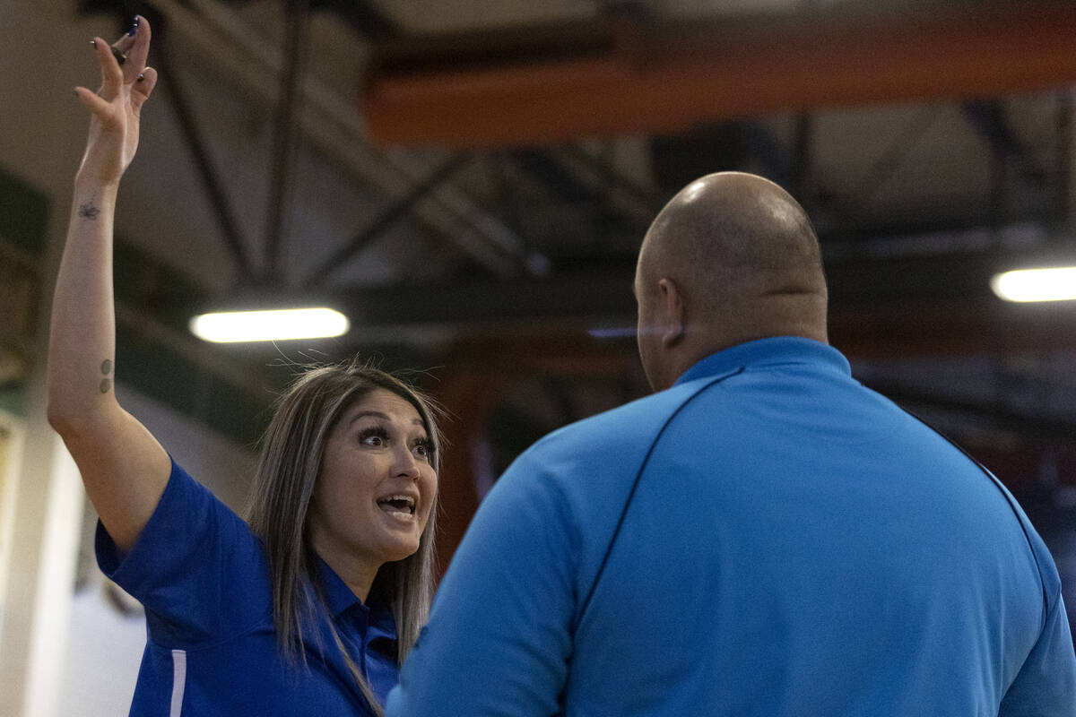 Green Valley head coach Analicia Gonzales argues with a referee during the Class 5A boys volley ...