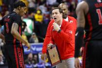 UNLV Rebels head coach Kevin Kruger talks with his team during the second half of a Mountain We ...