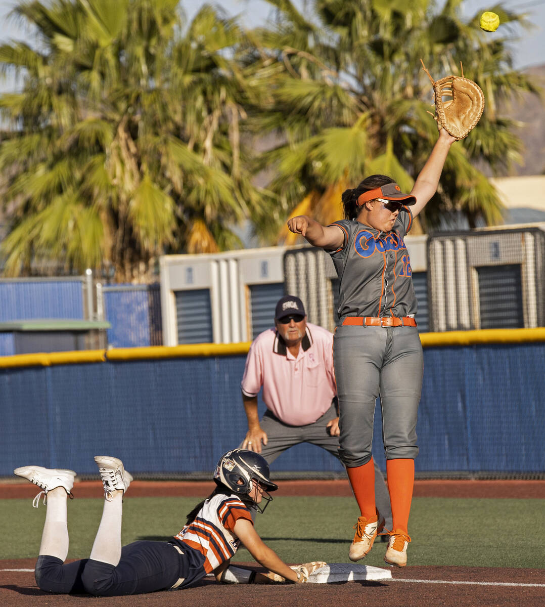 Bishop Gorman’s Jordyn Fray (12) leaps to try and catch a high throw as Legacy’s ...