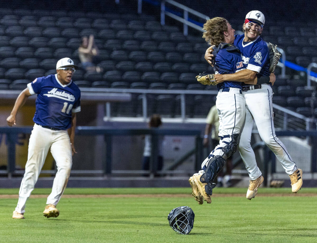 Shadow Ridge players celebrate their win over Legacy during their Class 4A state tournament bas ...