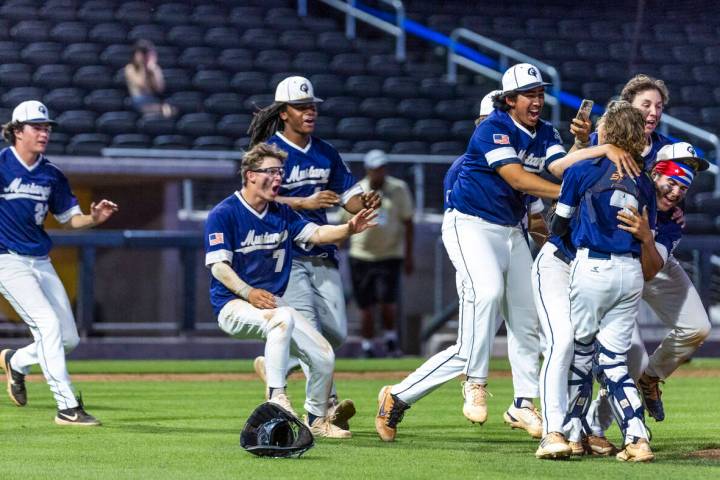 Shadow Ridge players celebrate their win over Legacy during their Class 4A state tournament bas ...