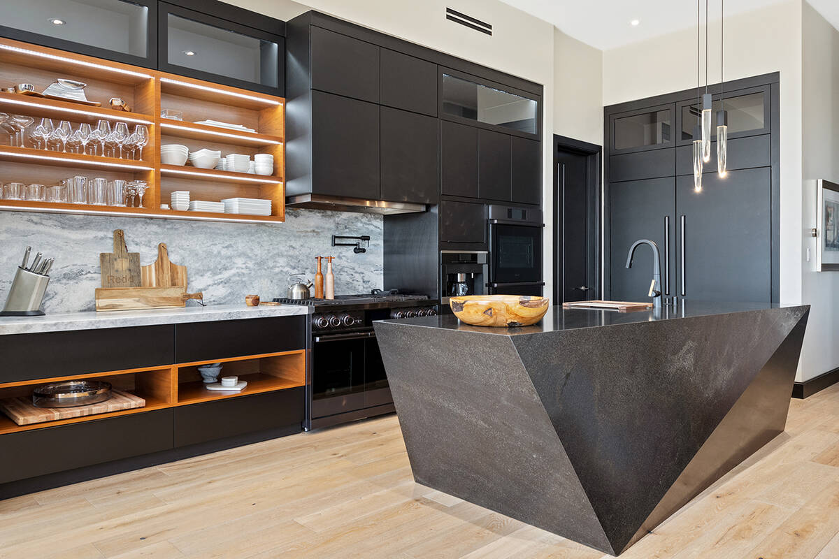 The kitchen has a modern look. The nearby dining room is attached to a courtyard. (Simply Vegas)