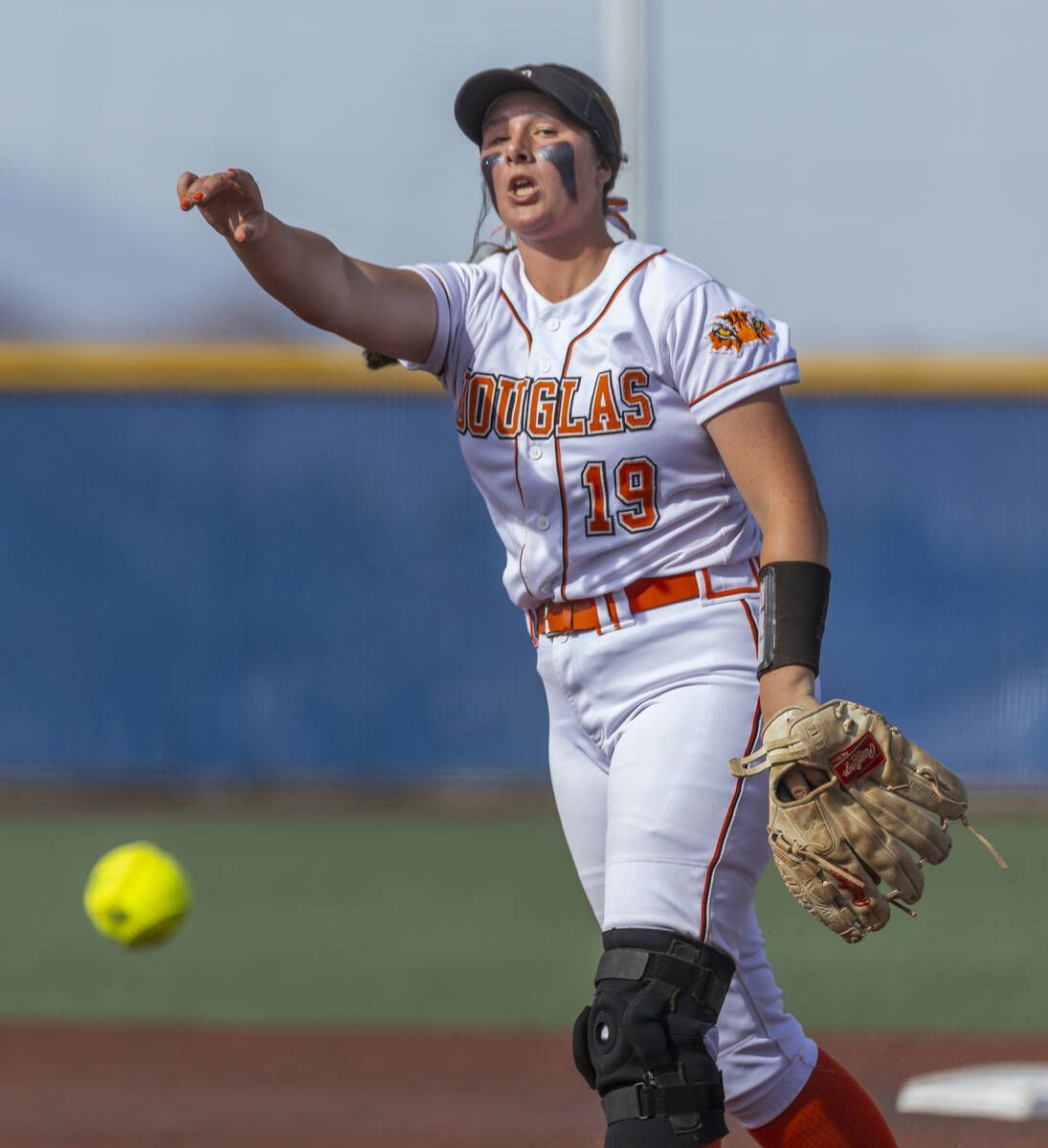 Douglas pitcher Talia Tretton (19) tosses another ball towards a Green Valley player during the ...