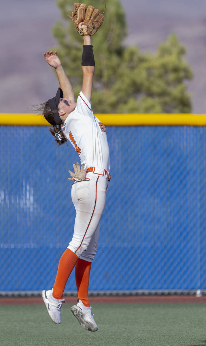 Douglas outfielder Emma Stagliano (1) elevates to catch a long fly ball from Green Valley durin ...