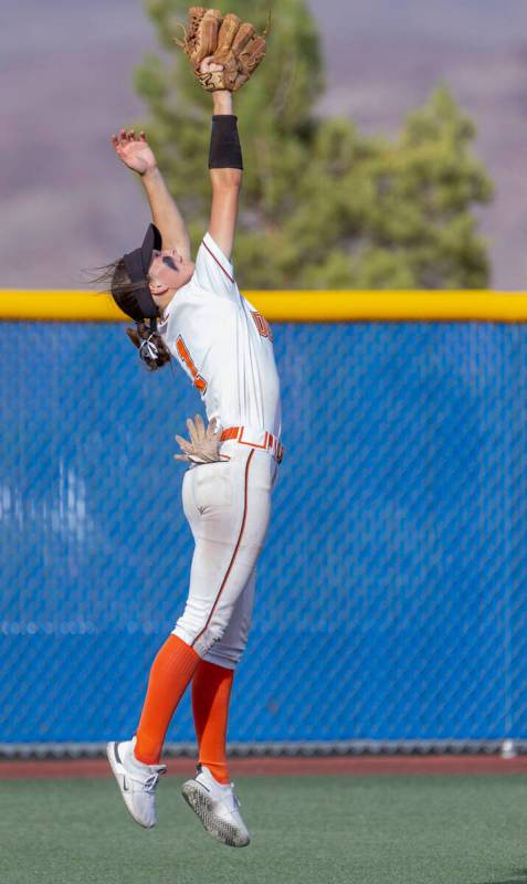 Douglas outfielder Emma Stagliano (1) elevates to catch a long fly ball from Green Valley durin ...