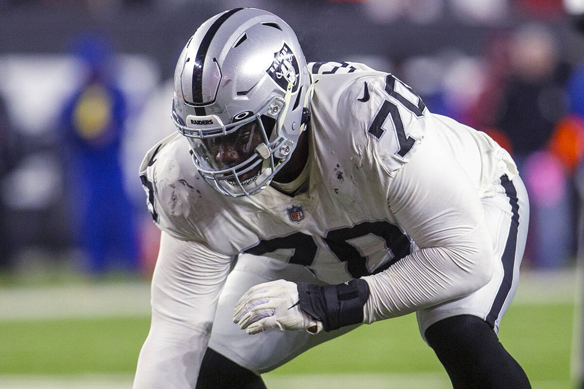 Raiders guard Alex Leatherwood (70) gets set for a play during the second half of an NFL playof ...