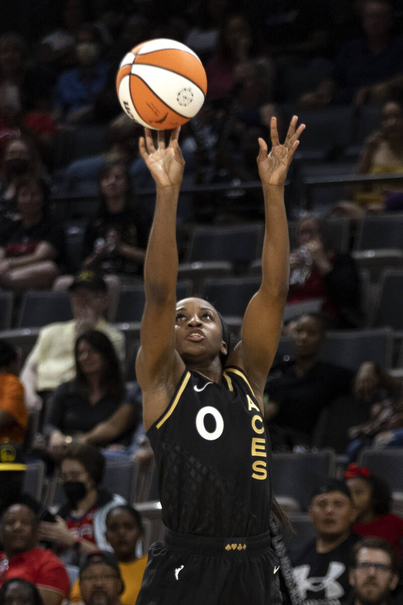 Las Vegas Aces guard Jackie Young (0) attempts a shot during the first half of a WNBA basketbal ...