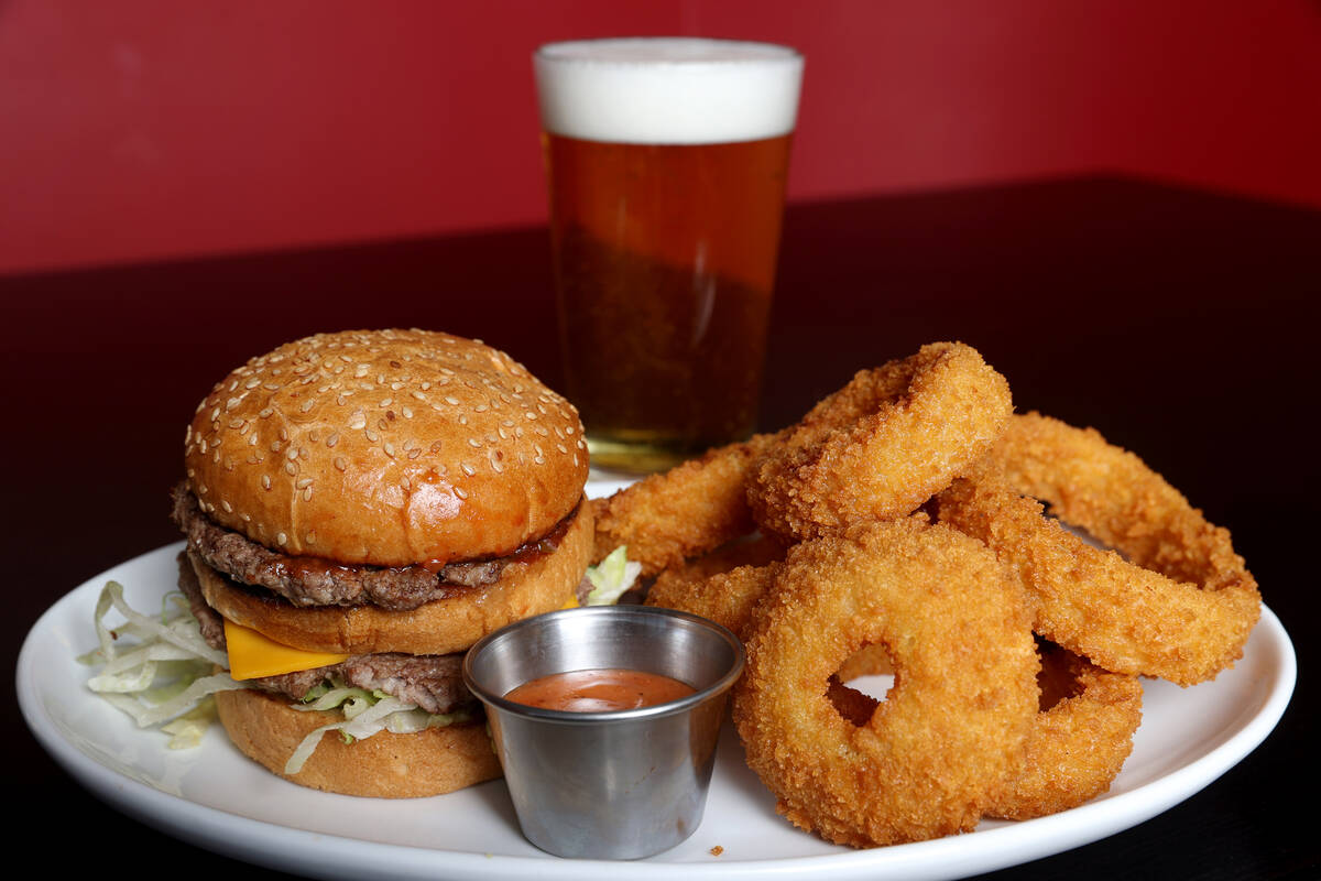 Big Boy with onion rings and a draft beer at Big Boy Tavern in the Skye Canyon community in nor ...
