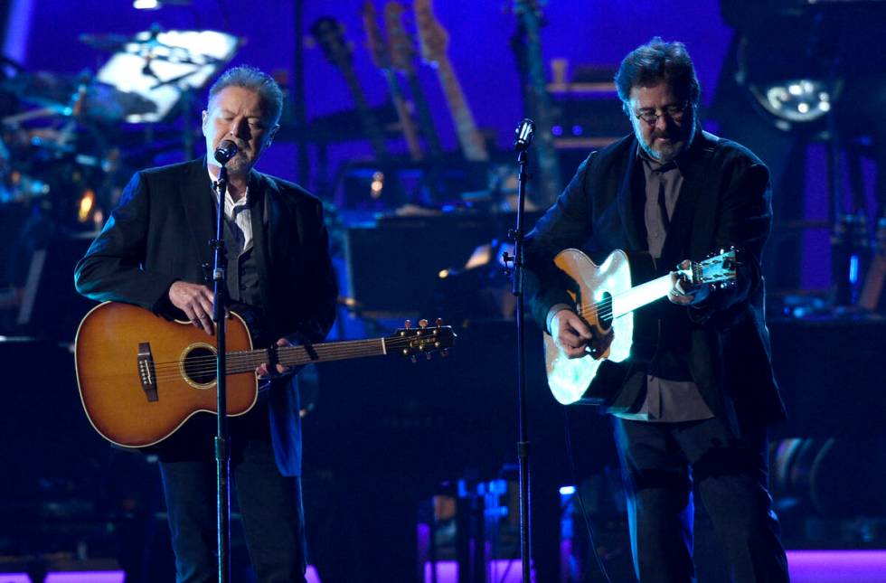 FILE - This Feb. 8, 2019 file photo shows Don Henley, left, and Vince Gill performing "Eag ...