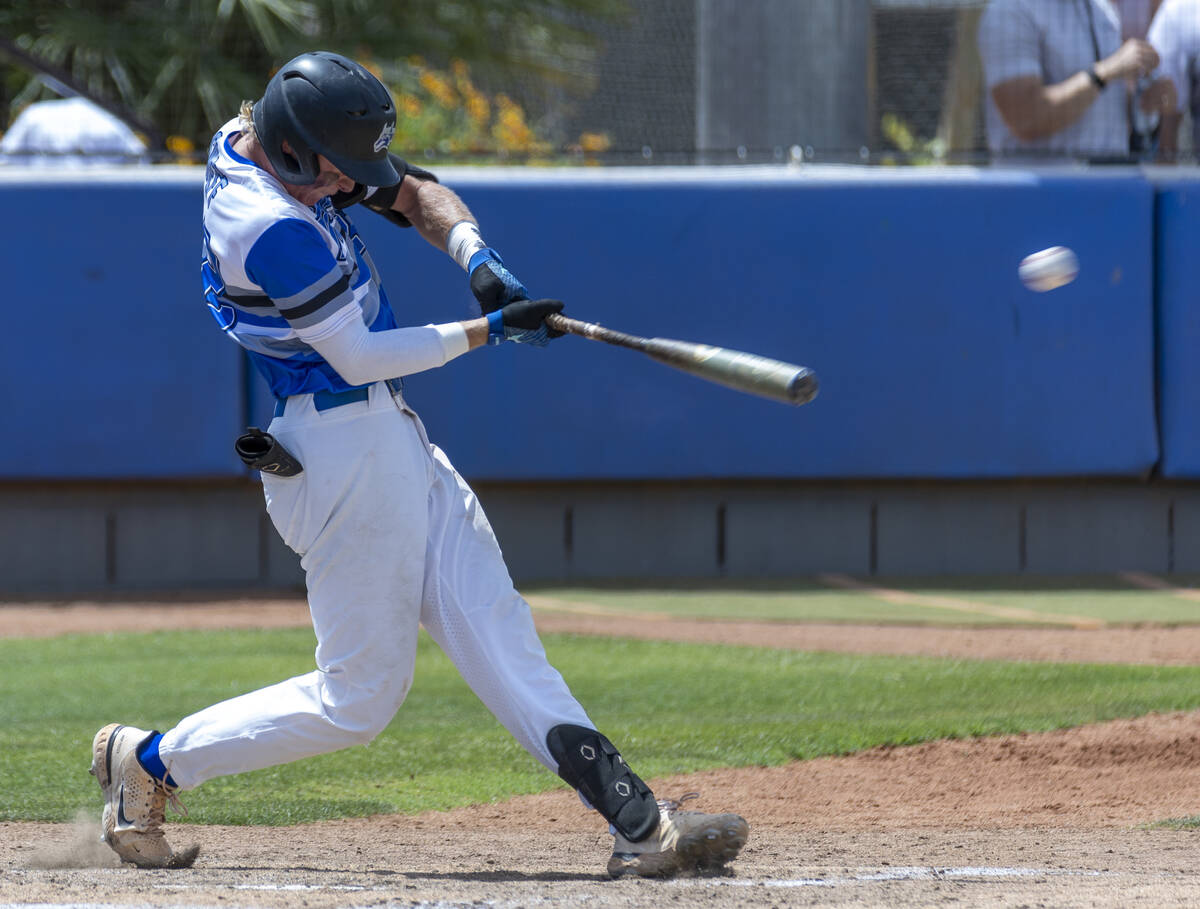 Basic batter Cooper Sheff (22) drives a pitch deep versus Bishop Manogue during their Class 5A ...
