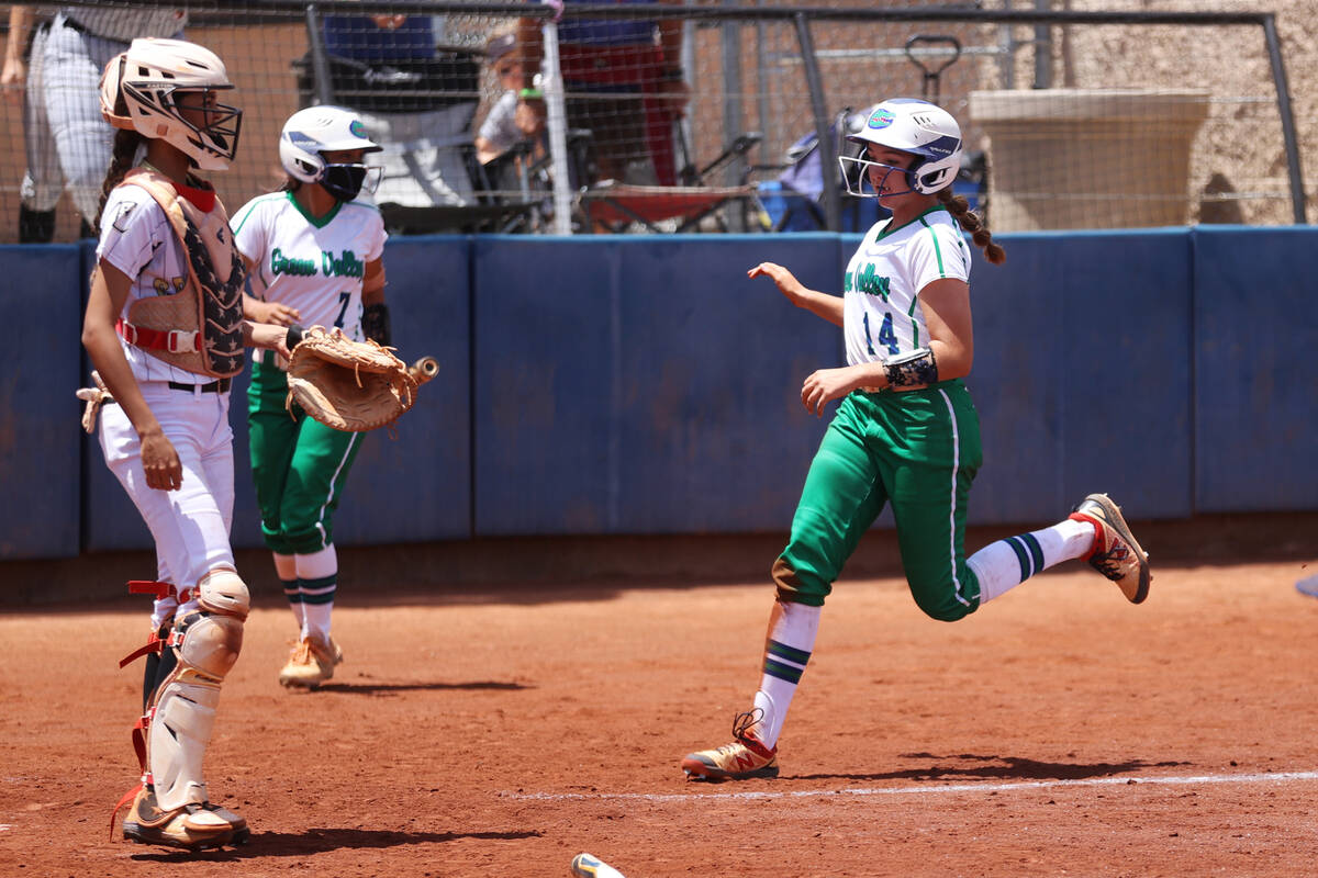 Green Valley's Rustie Riley (14) runs home for a run against Faith Lutheran during a Class 5A s ...